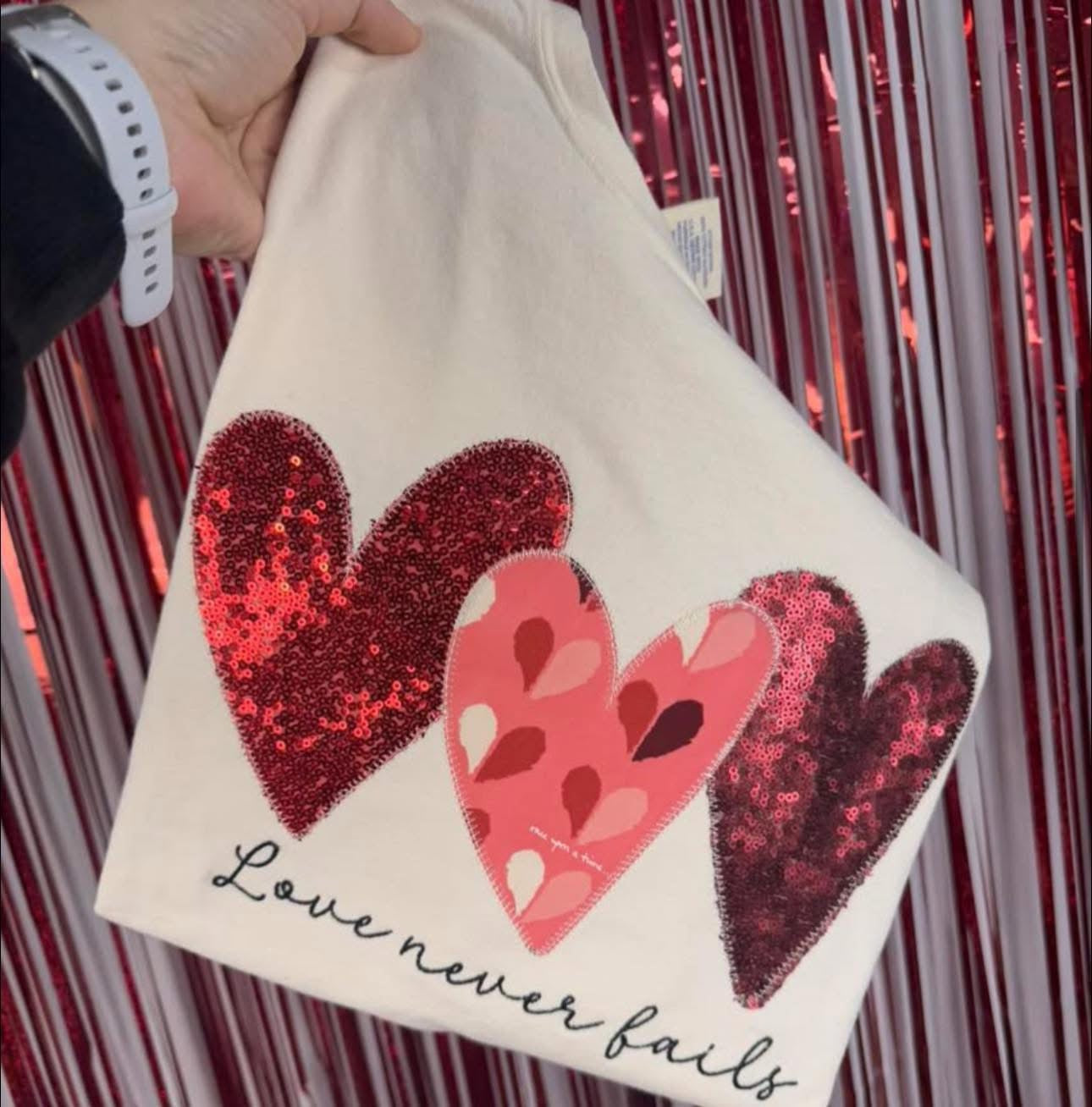 Love Never Fails Tee