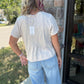 The Little Extra Tee